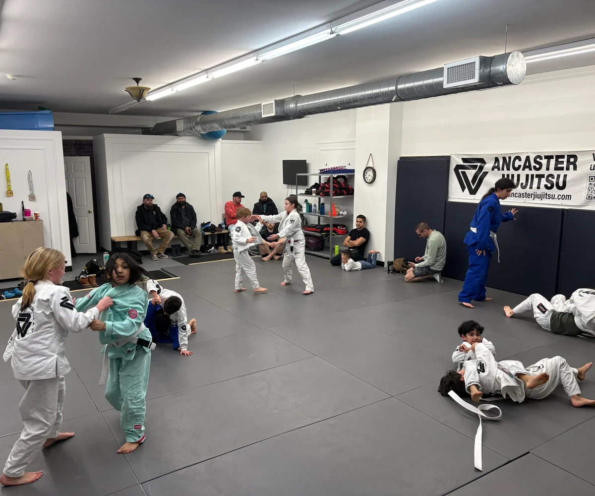 Apprentice assisting a Jiu-Jitsu class at Ancaster Jiu-Jitsu